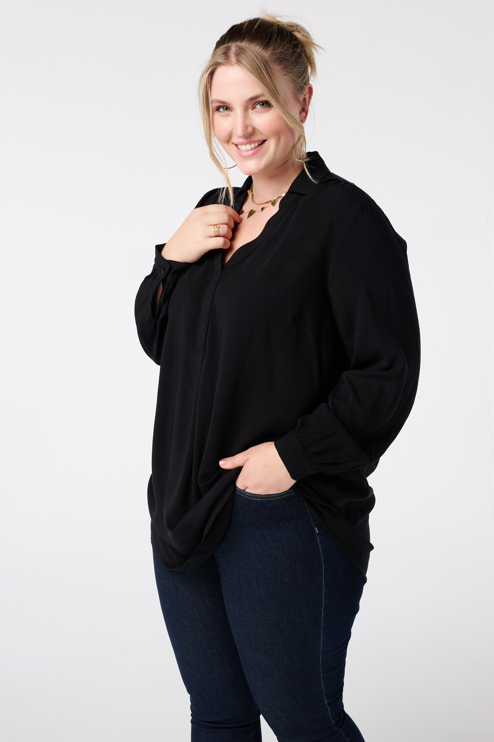 Ruimvallende blouse met v-hals