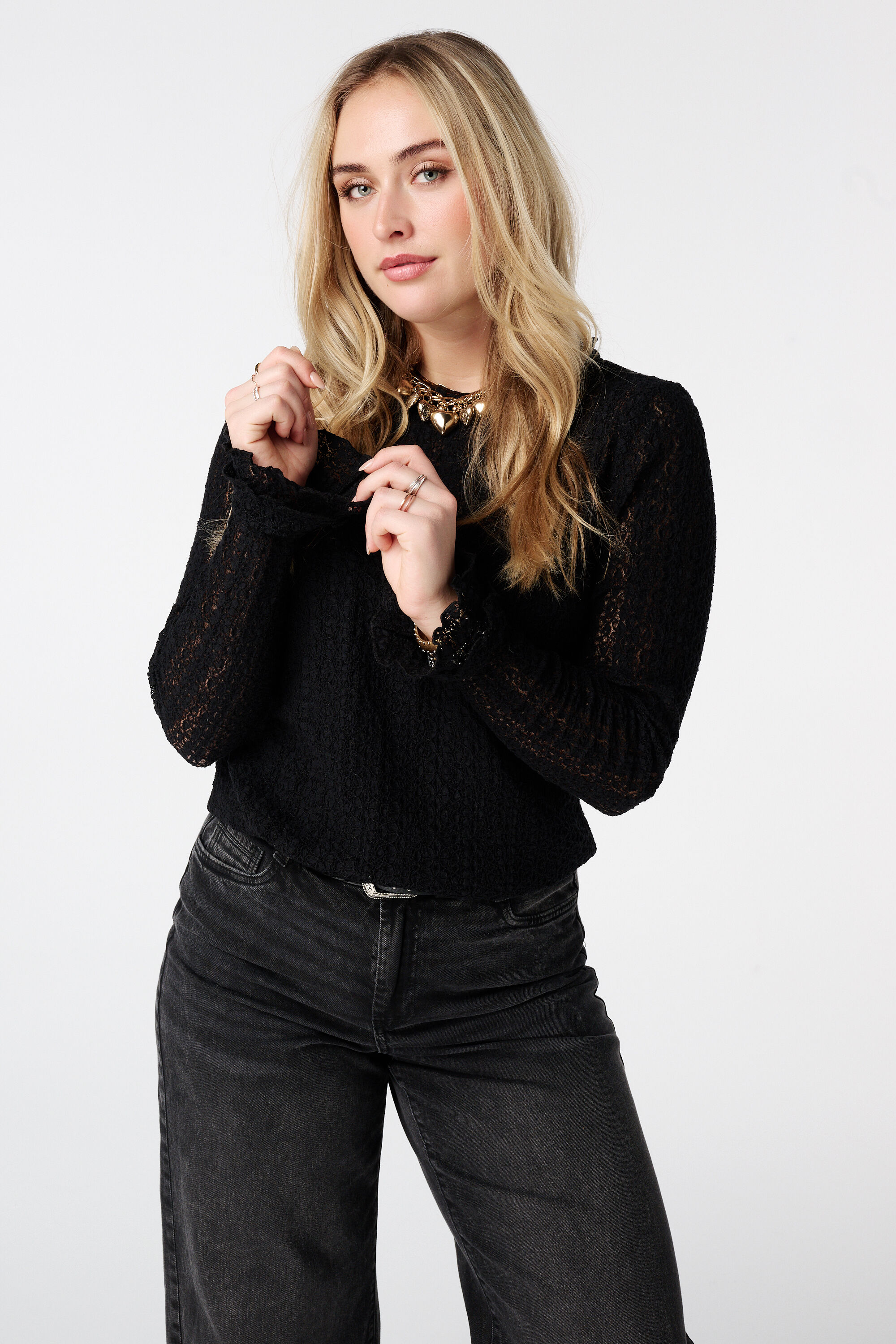 Kanten top met trompetmouwen