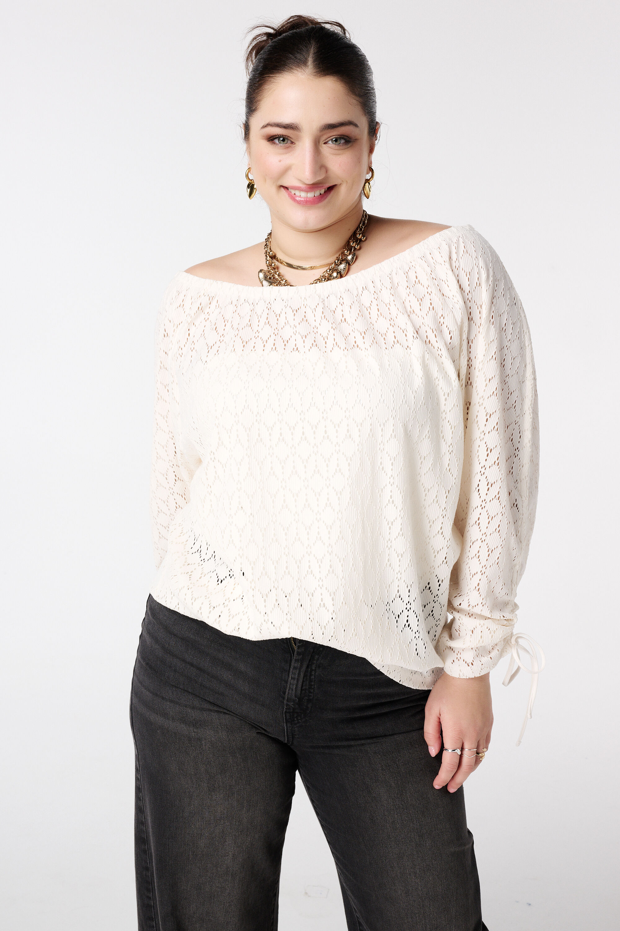 Top met opengewerkt dessin