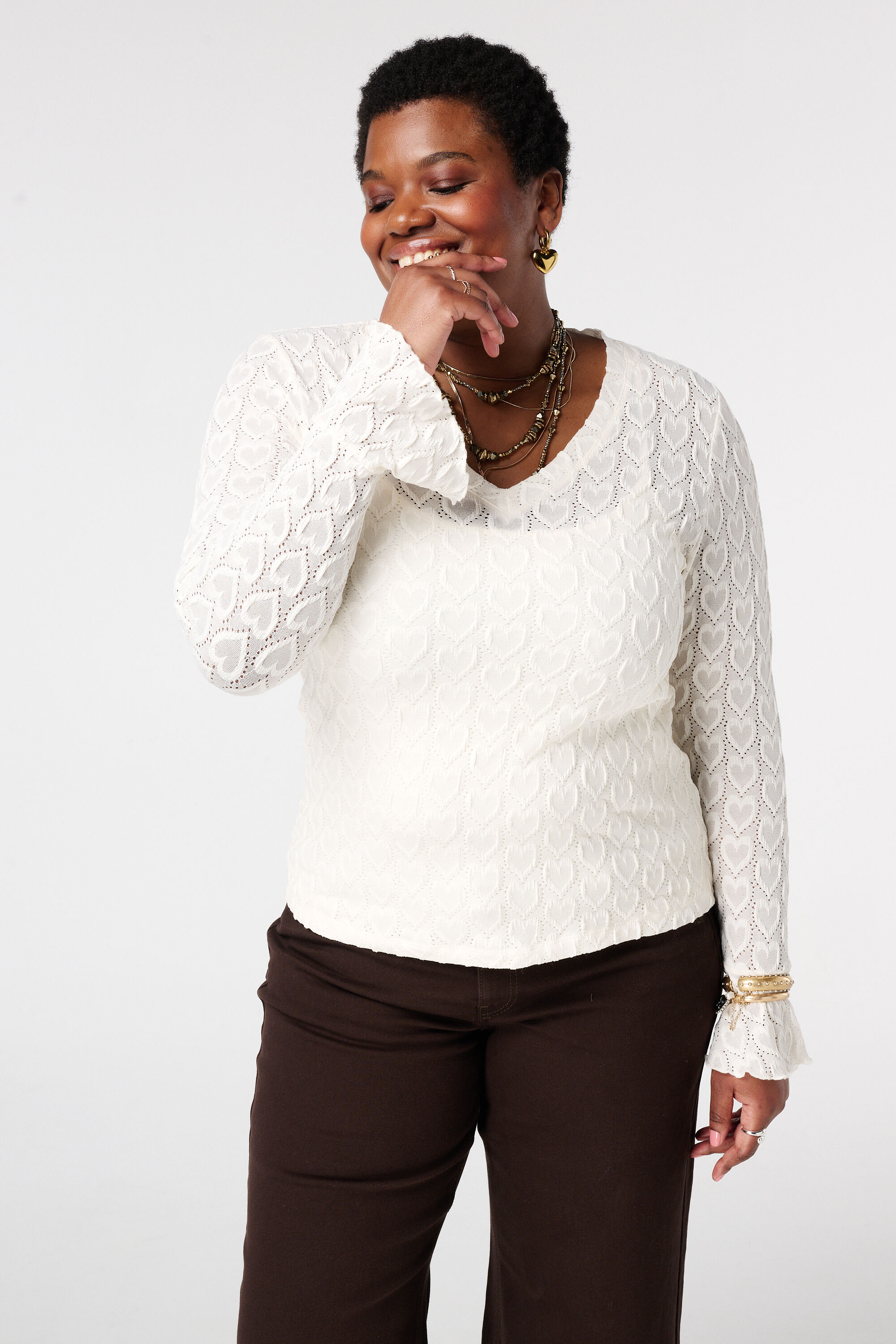 Top met trompetmouwen