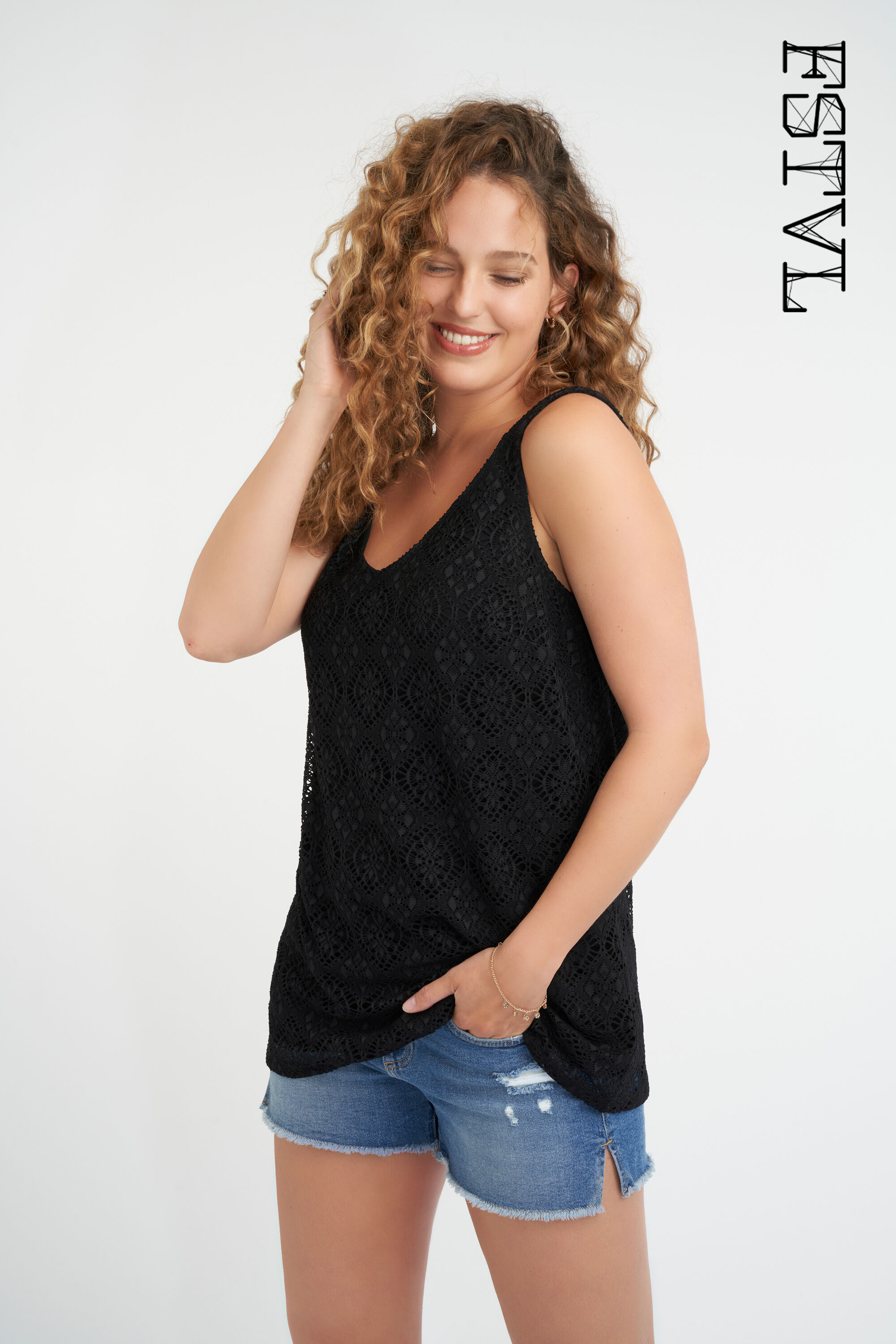 Mouwloze top met kant