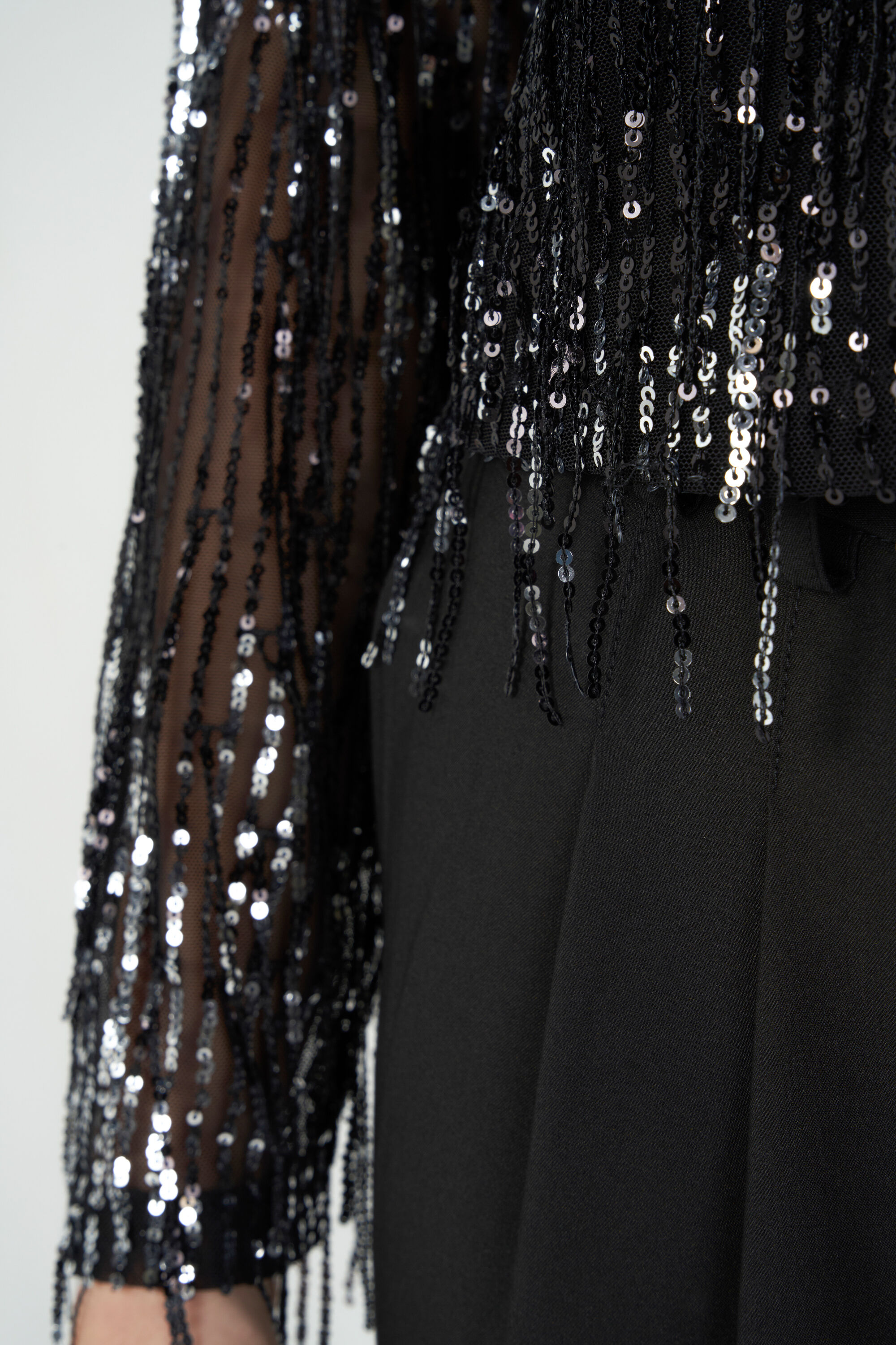 Top met pailletten en franjes image number 4