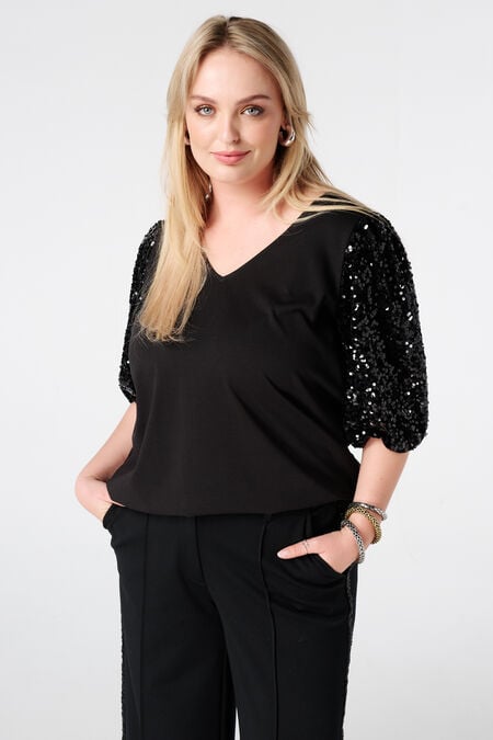 Top met pailletten pofmouwen Top met pailletten pofmouwen