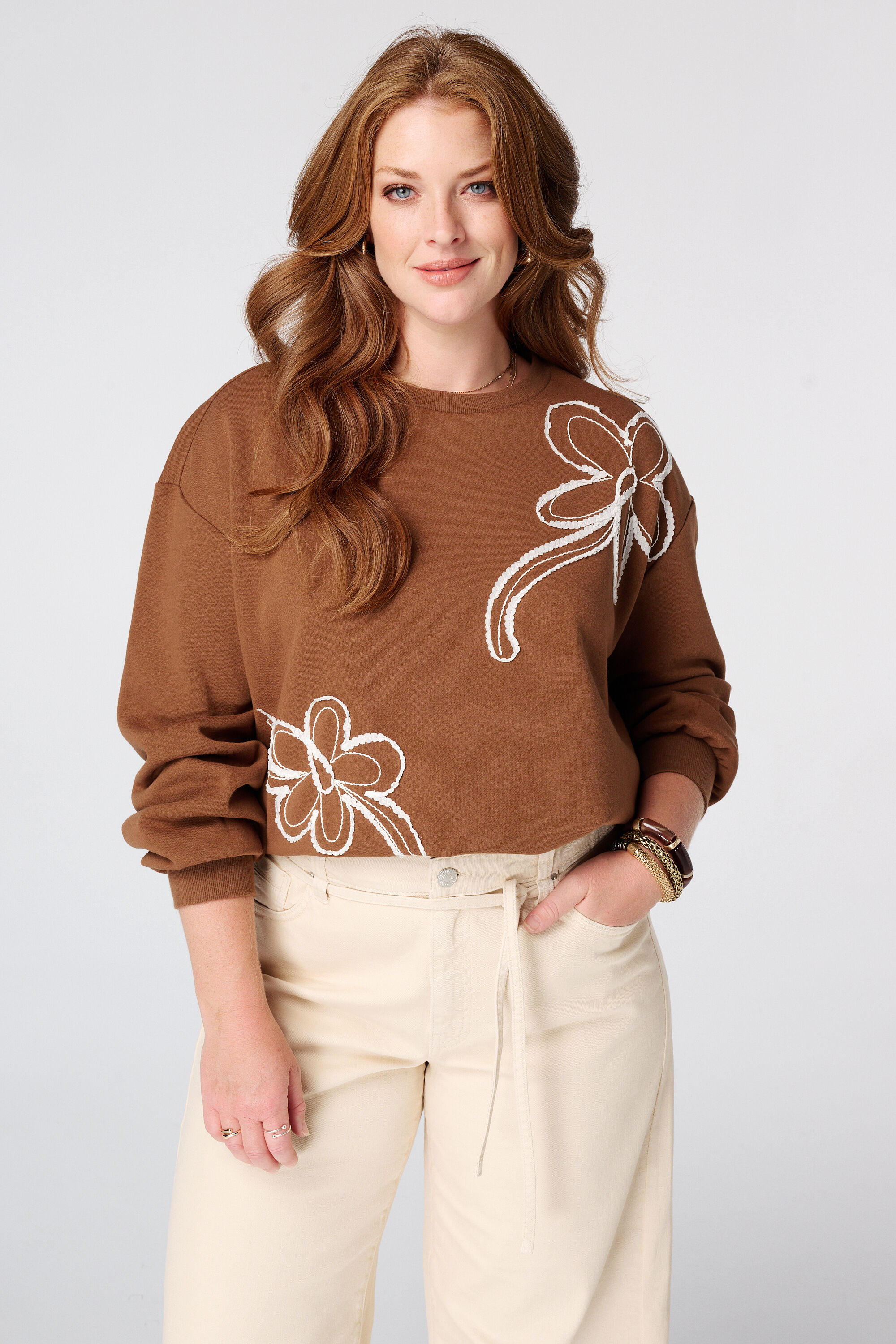 Sweater met borduursel