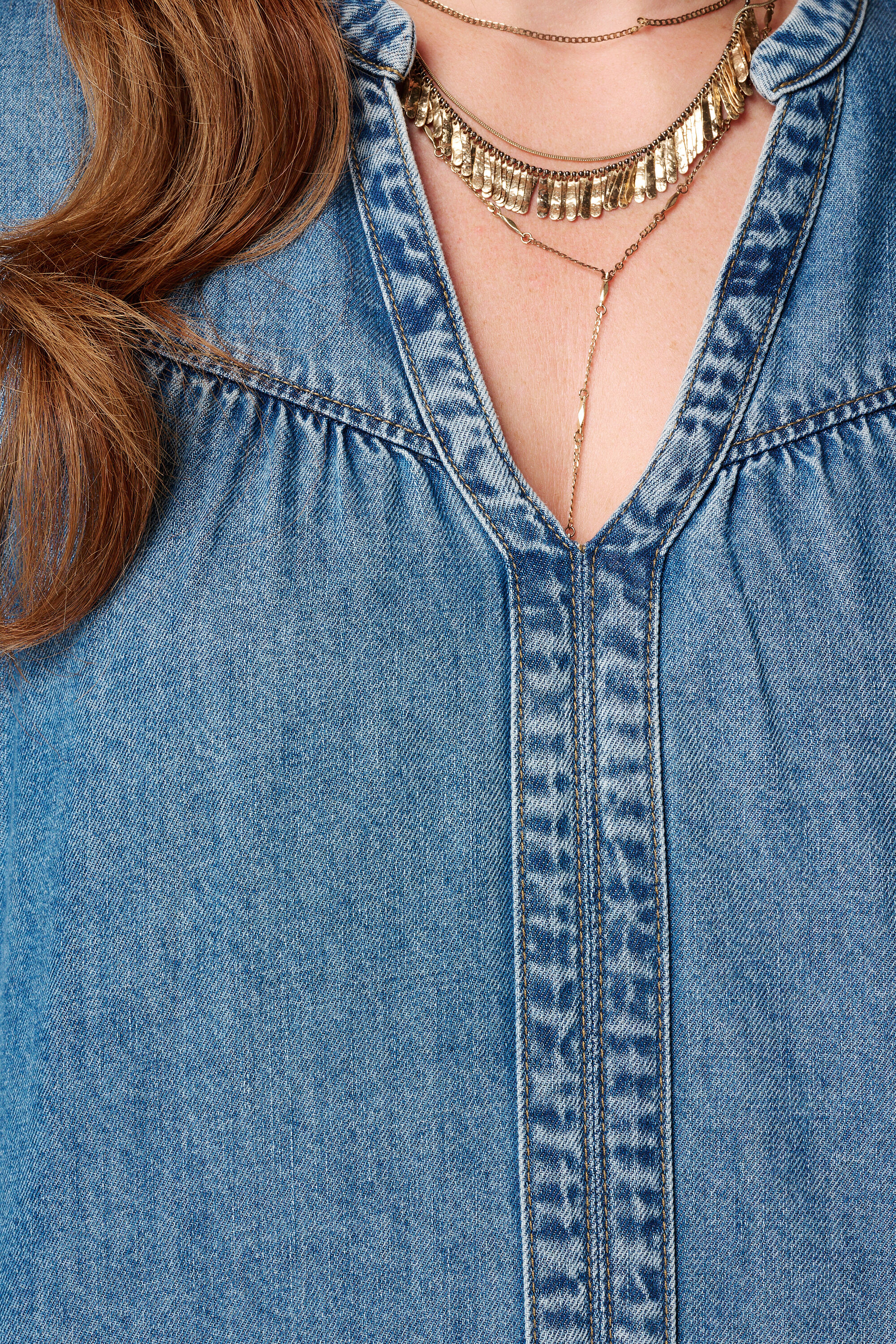 Denim blouse met trompetmouwen image number 4