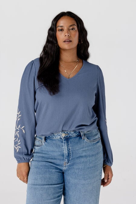 Top met broderie mouwen Top met broderie mouwen