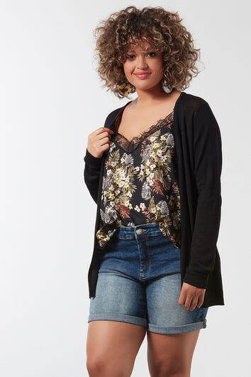 Openvallend vest met open structuur