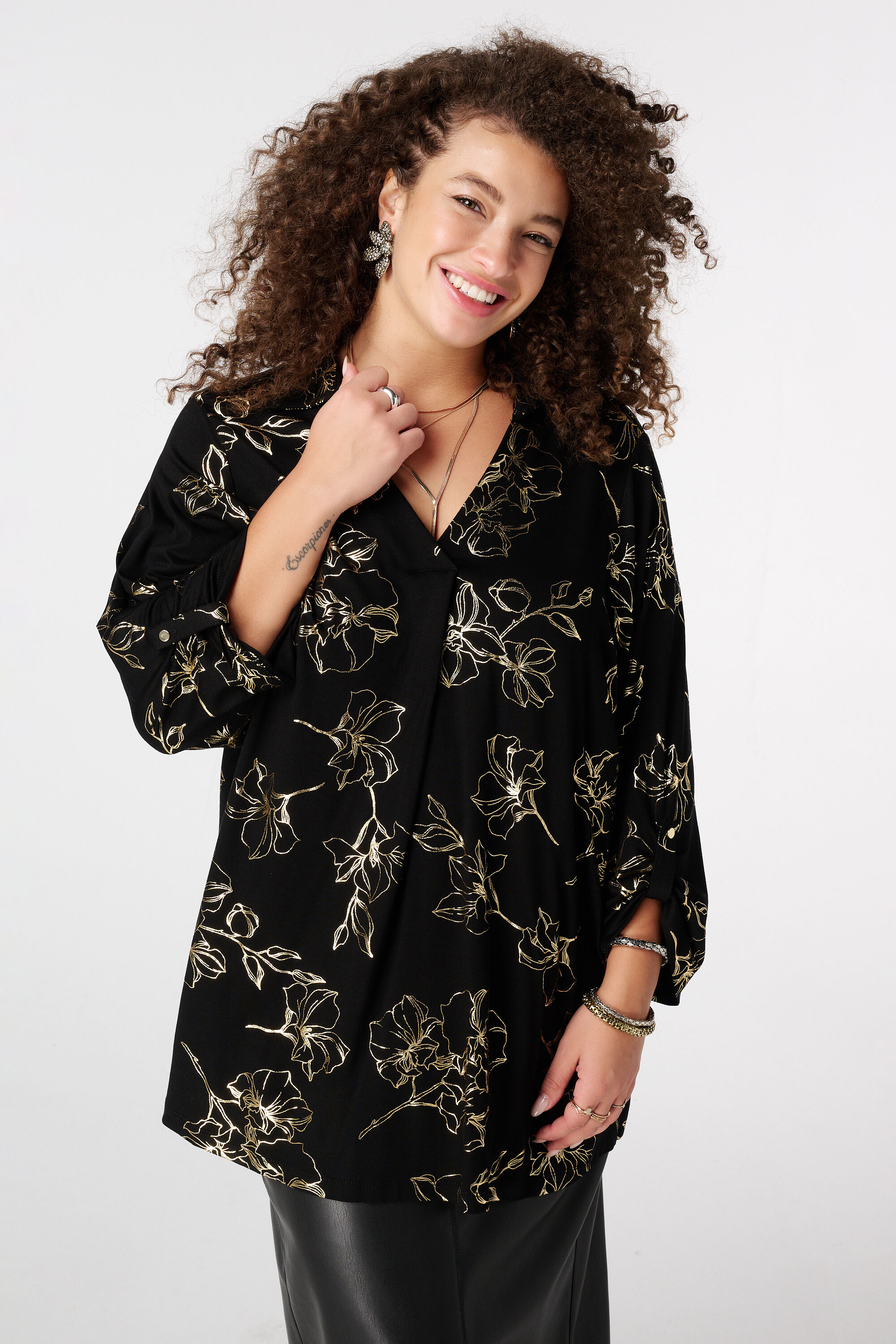 Top met stretch en foil print