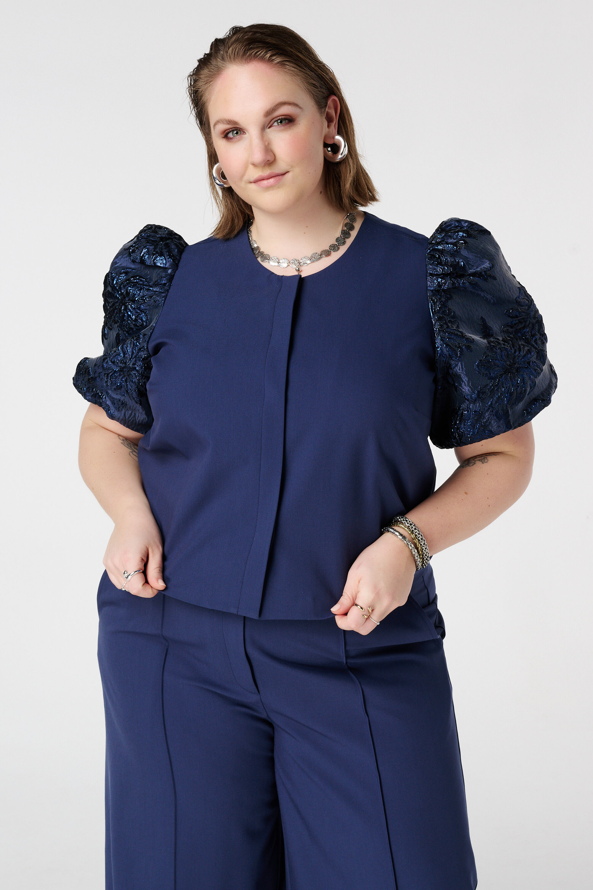 Top met jacquard mouwen