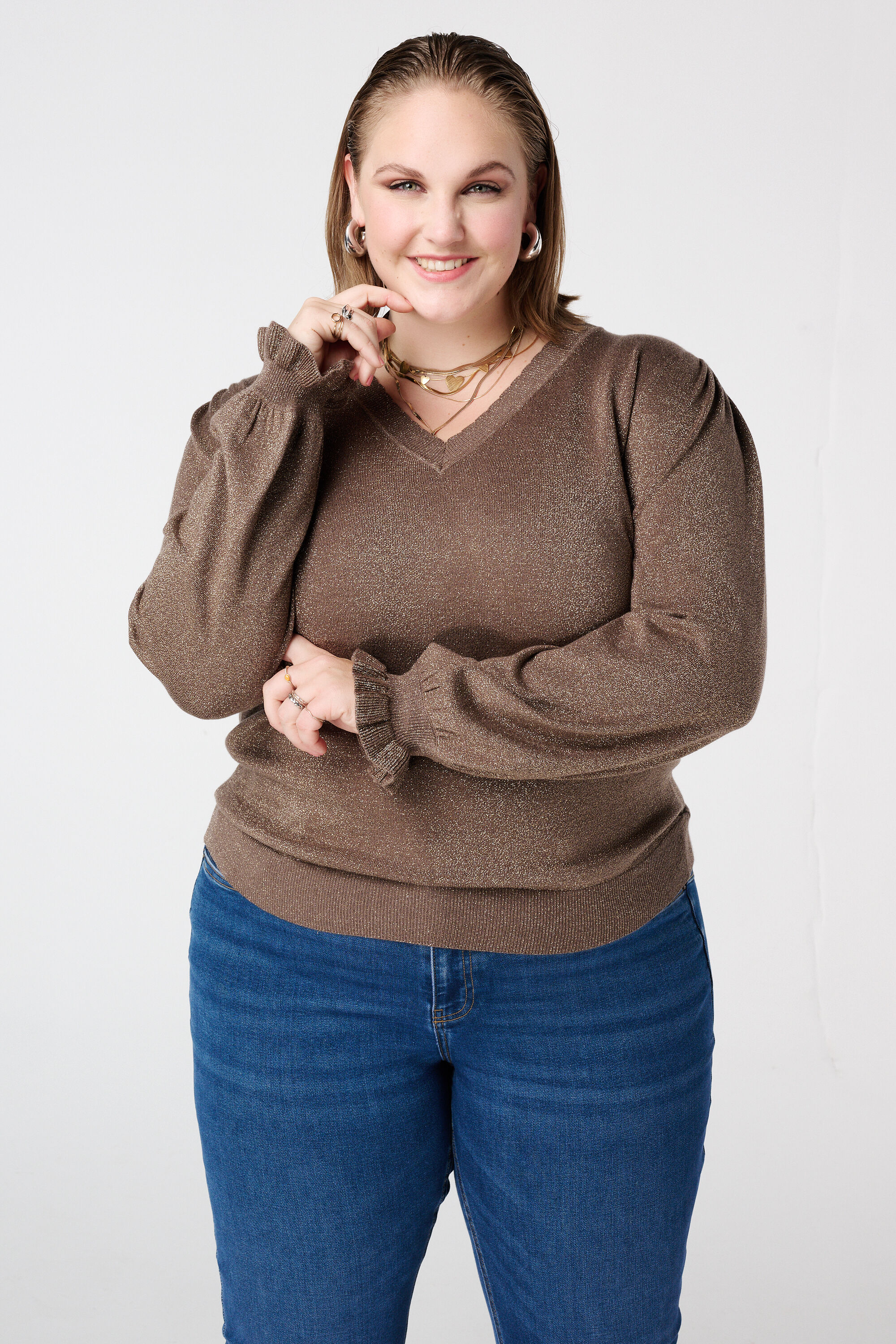 Lurex trui met ruffle mouw