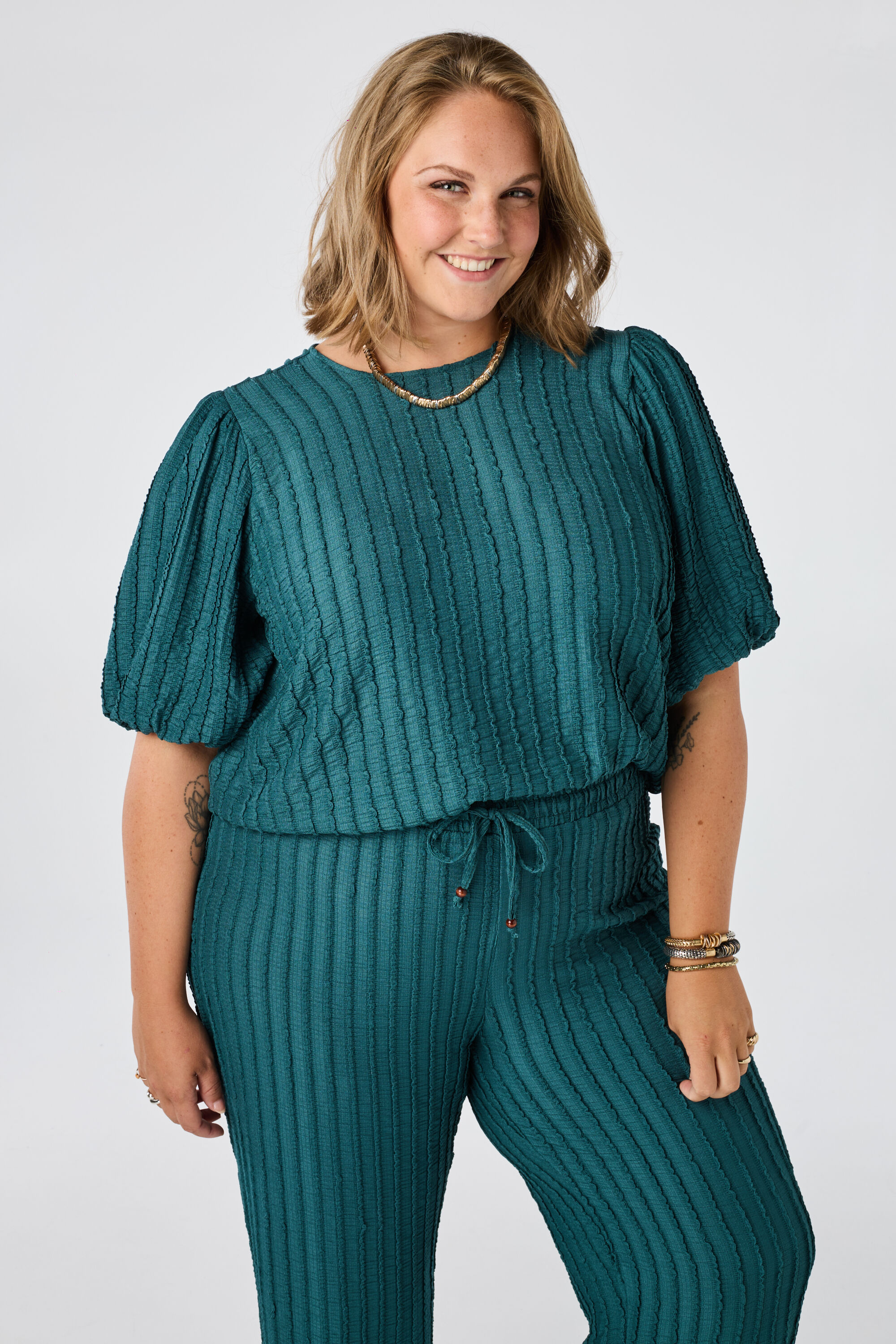 Crinkle top met pofmouwen