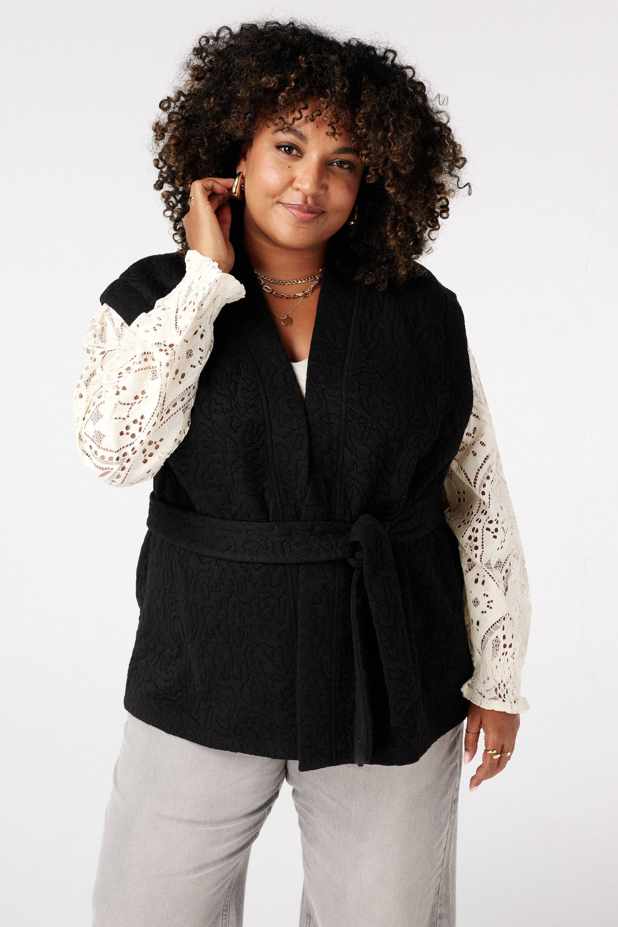 Halflang gilet met bindceintuur