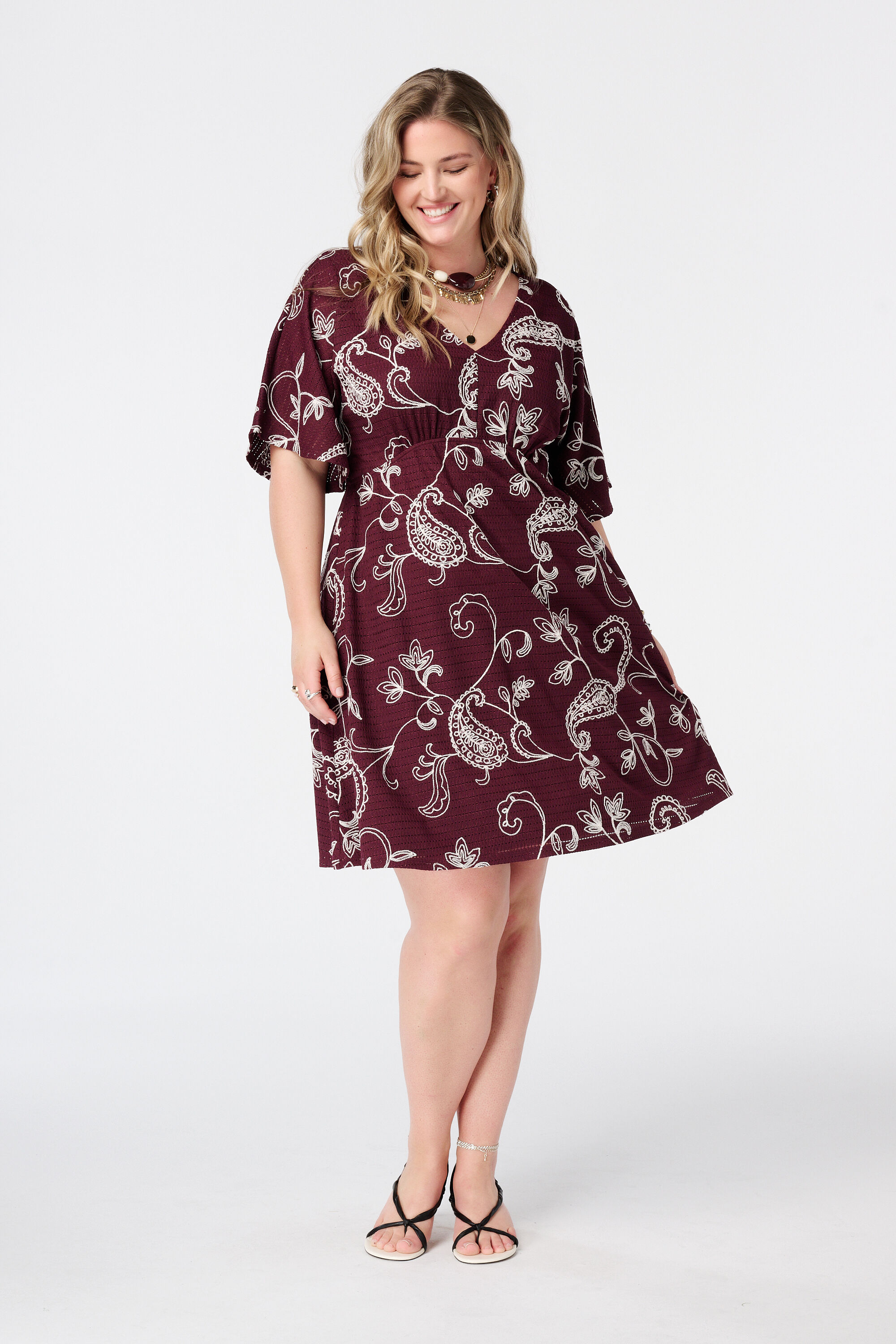 Kort jurkje met vlindermouwen