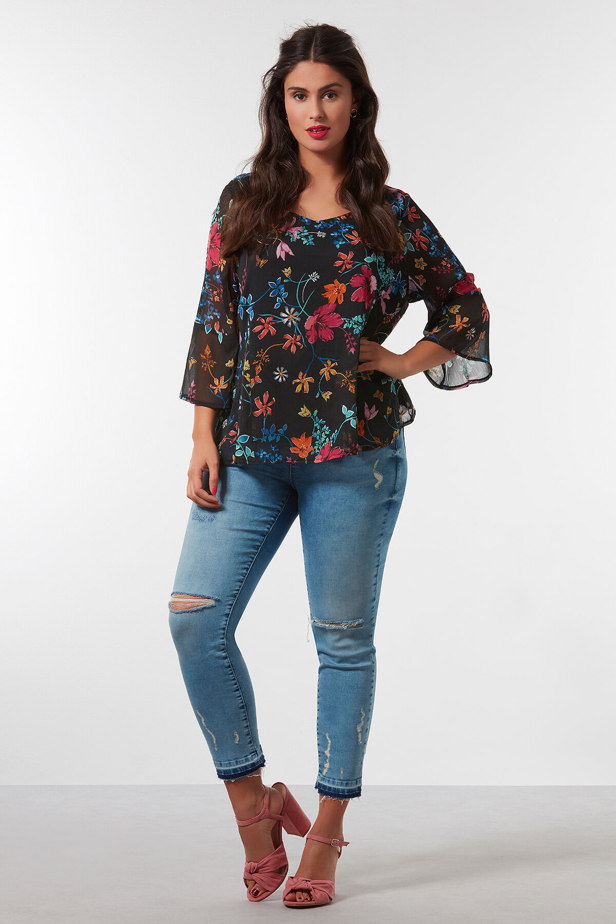 Slim leg jeans met scheuren image number 5