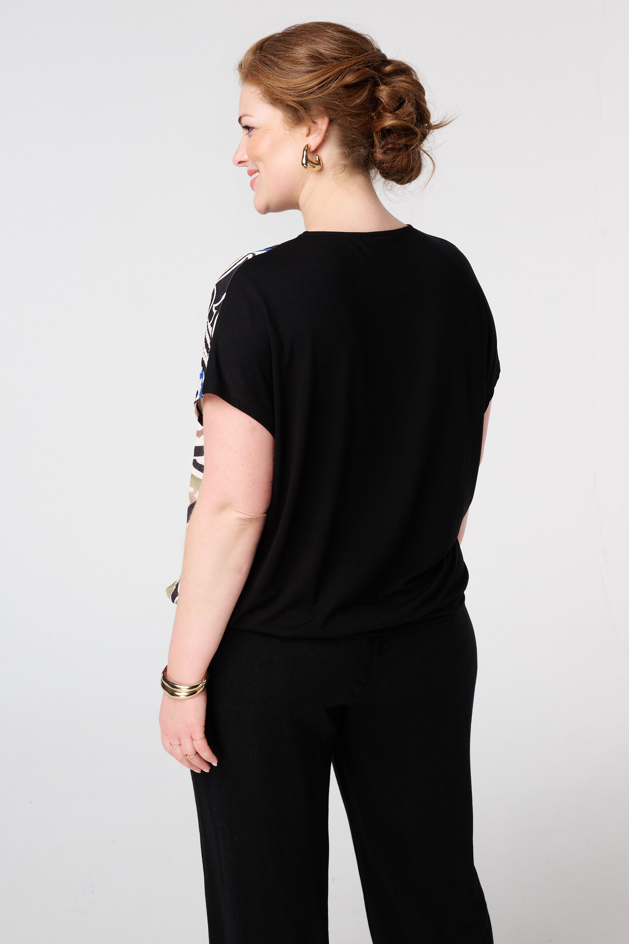 Top met structuur en V-hals image number 3