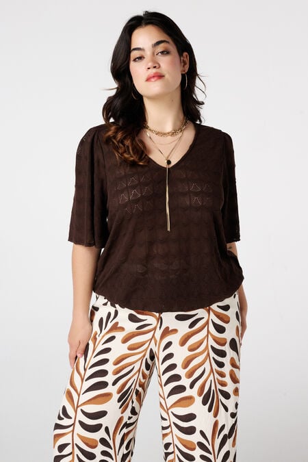 Top met opengwerkt dessin Top met opengwerkt dessin