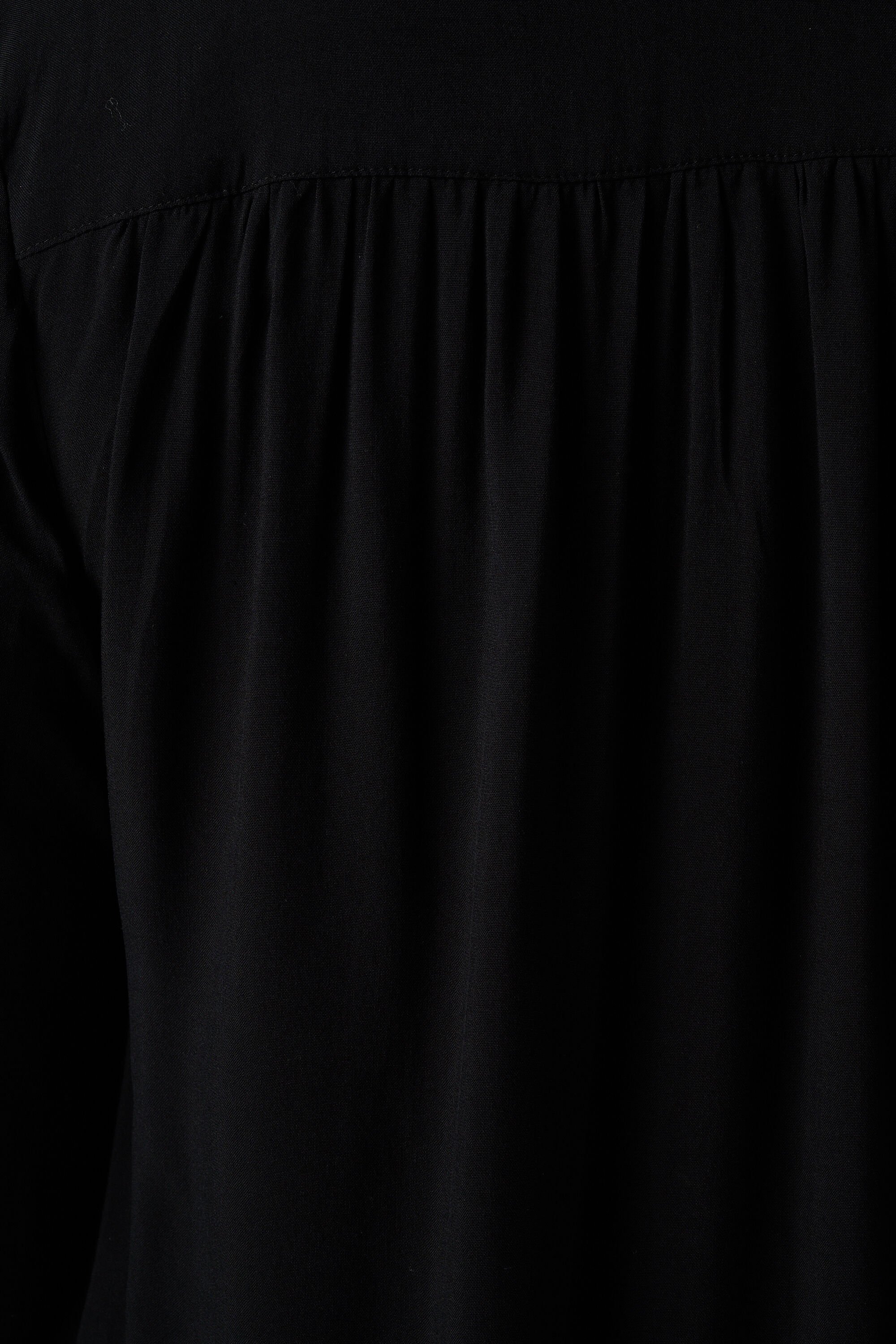 Ruimvallende blouse met v-hals image number 6