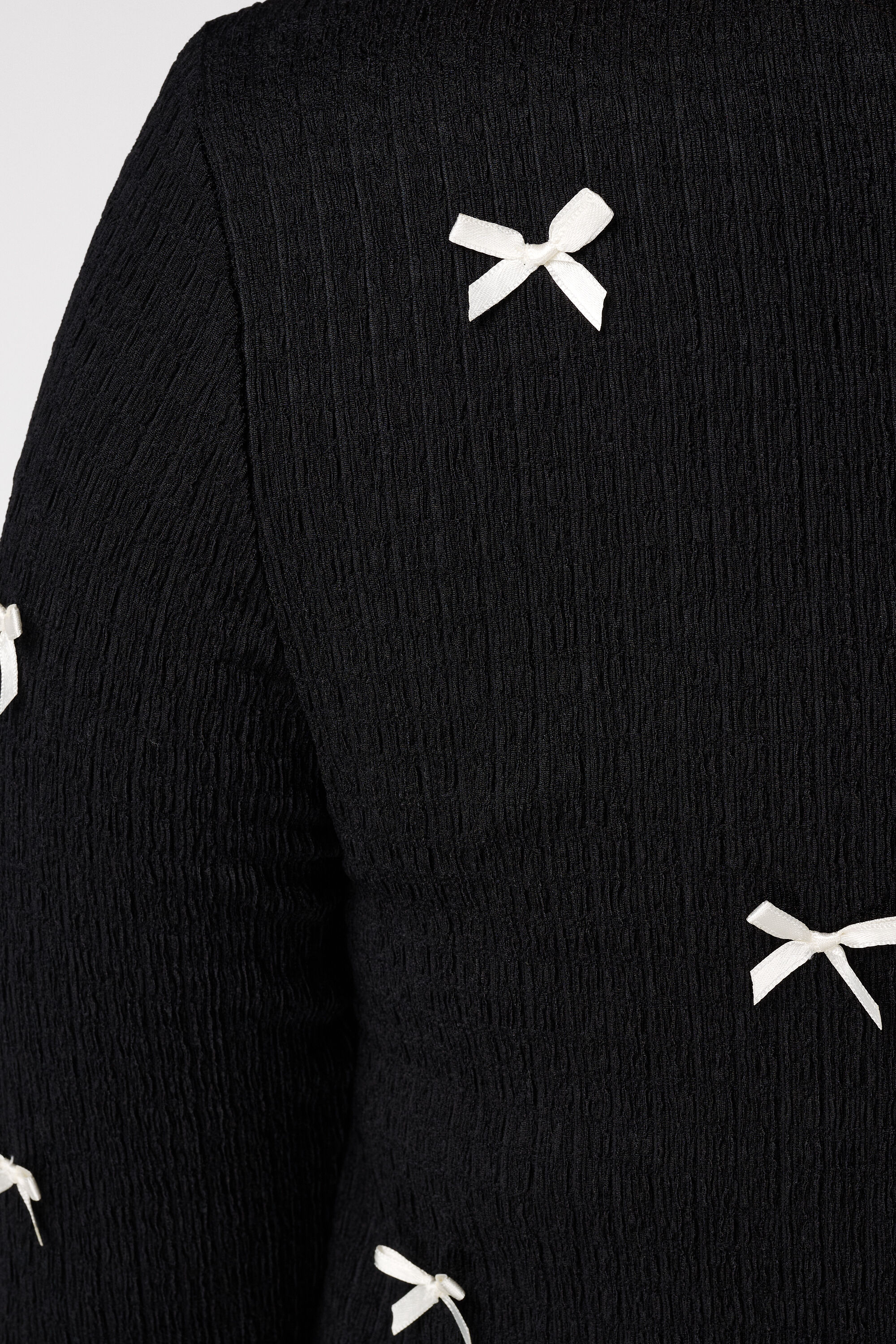 Top met strikdetails image number 6