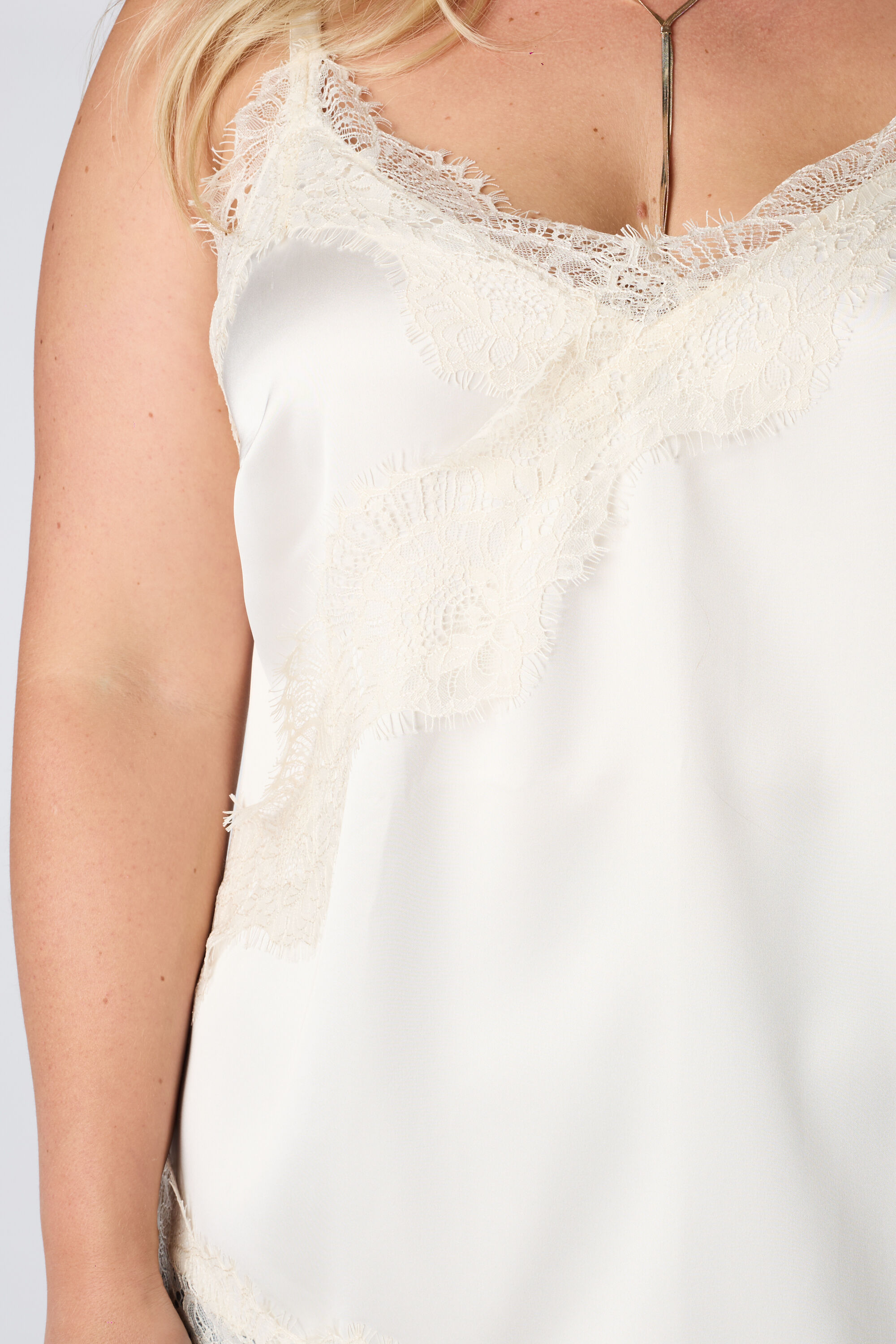 A-symmetrische blouse met kant image number 6