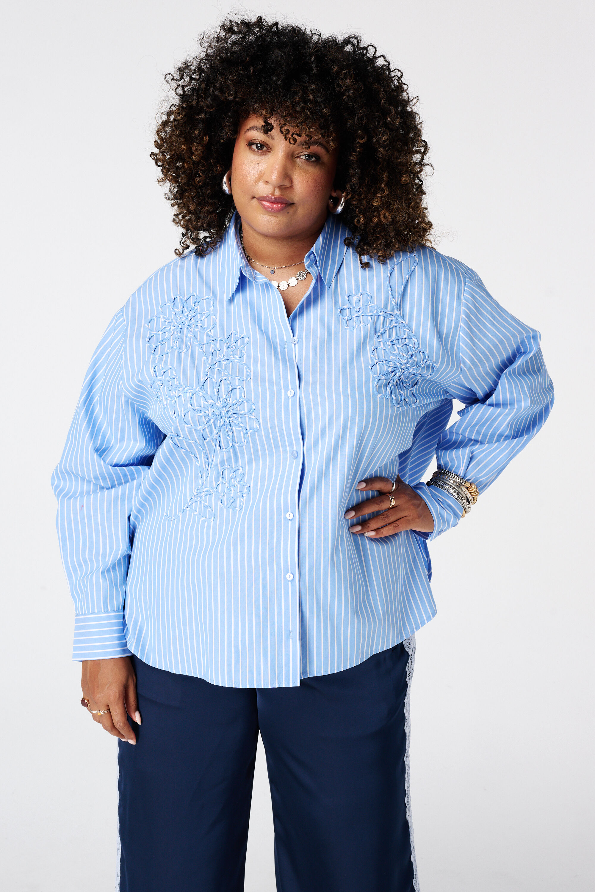 Gestreepte blouse met borduursel