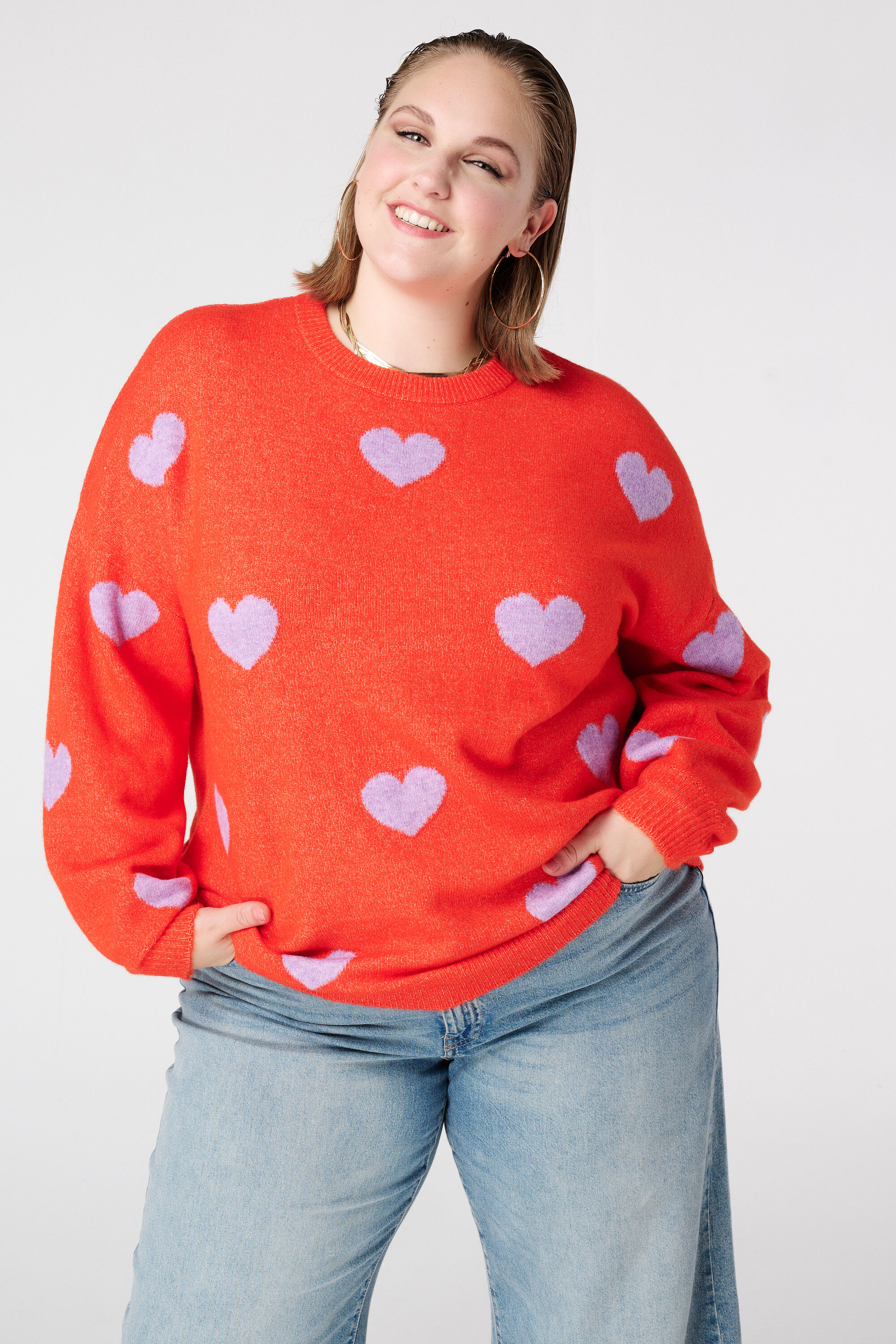 Gebreide trui met hartjespatroon