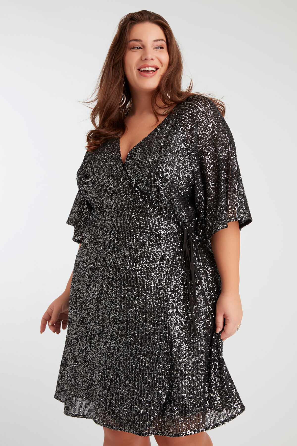 Wikkeljurk met pailletten image number 6