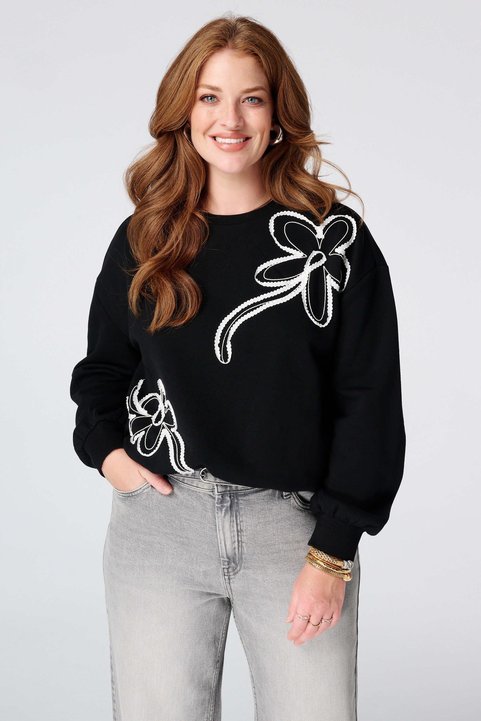 Sweater met borduursel