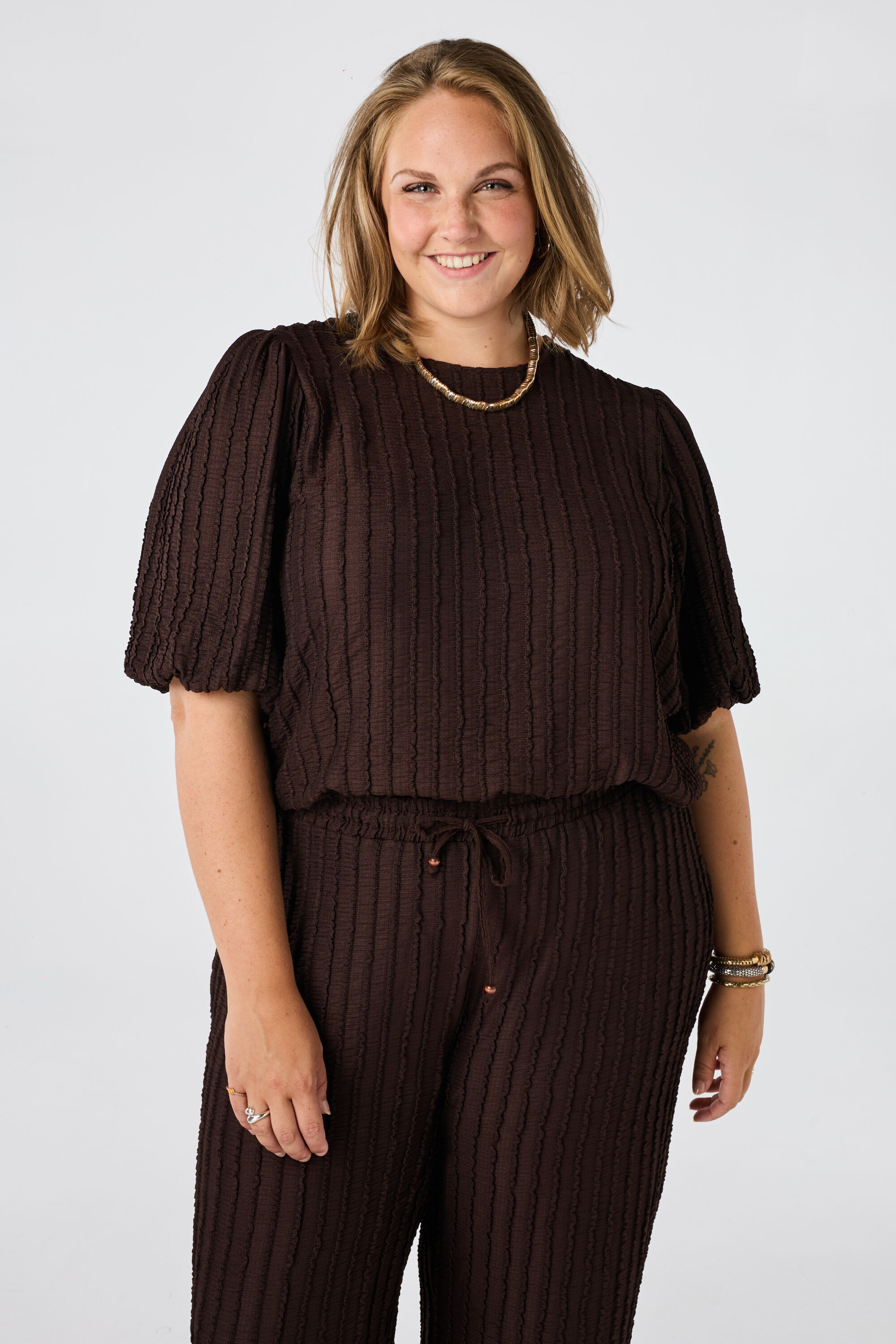 Crinkle top met pofmouwen