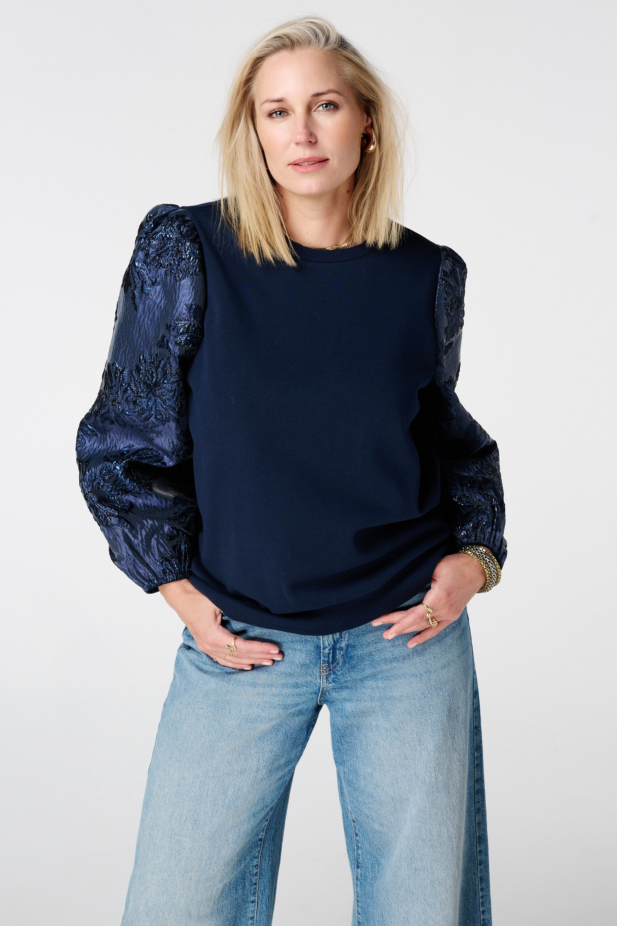 Sweater met jacquard mouwen
