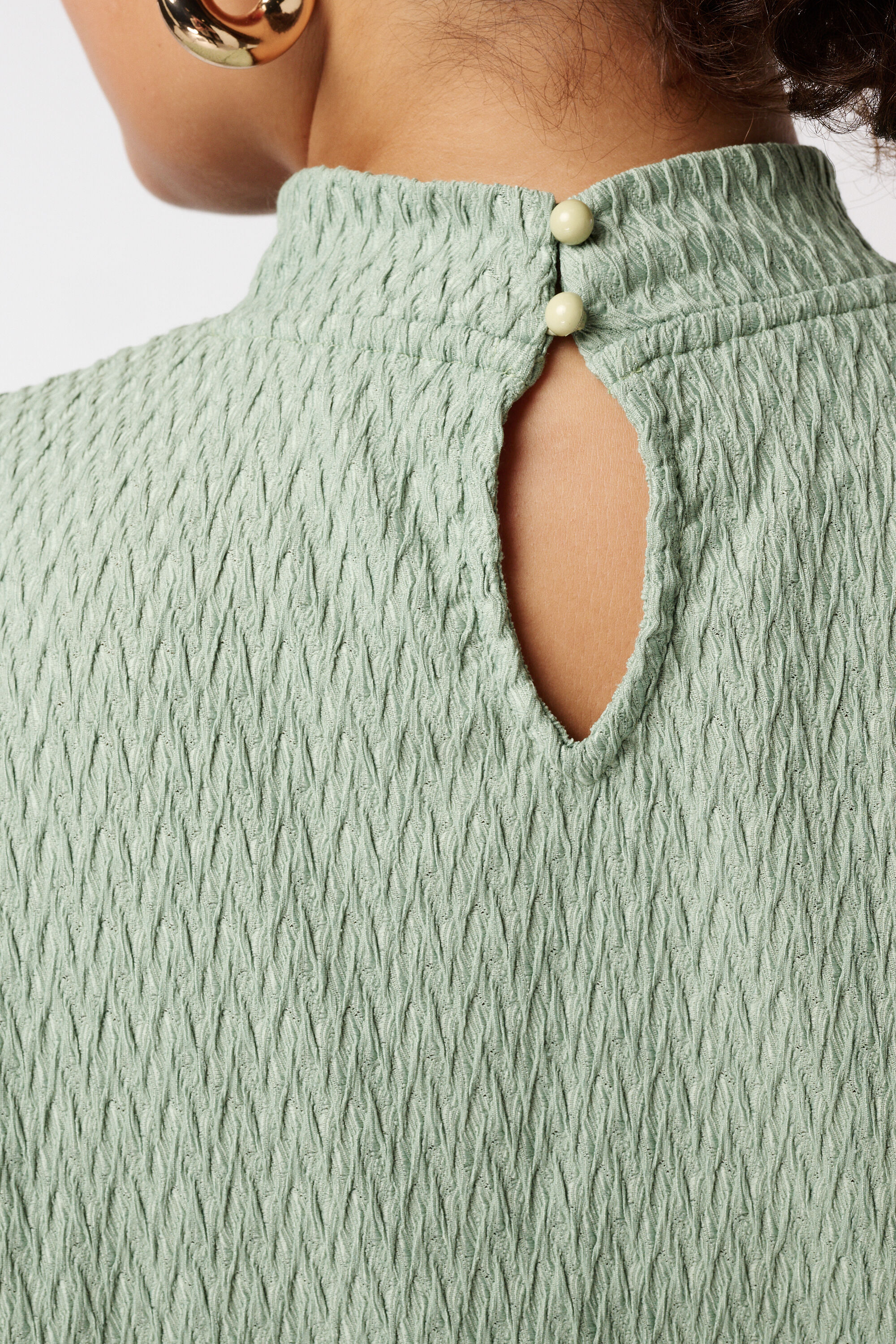 Top met structuur image number 6