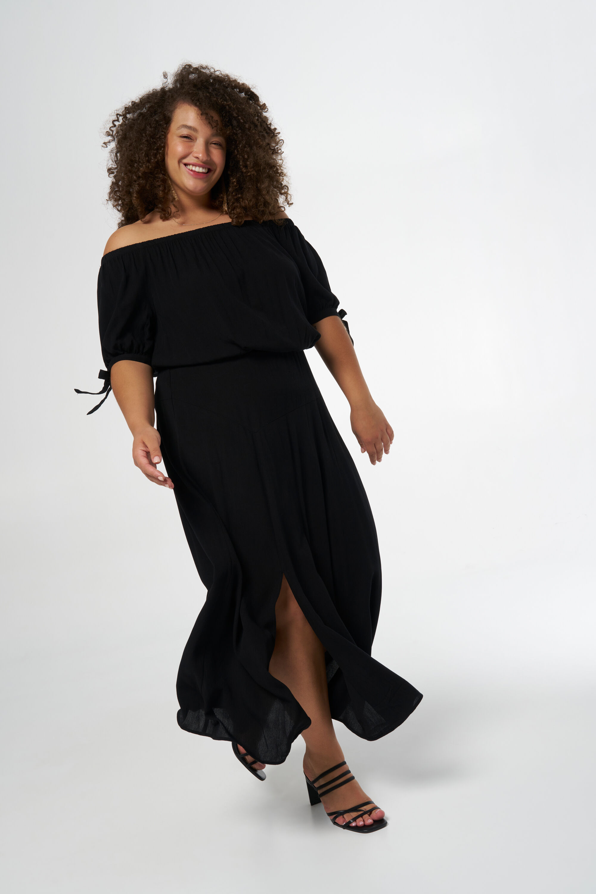 Zwarte midi rok met split outlet