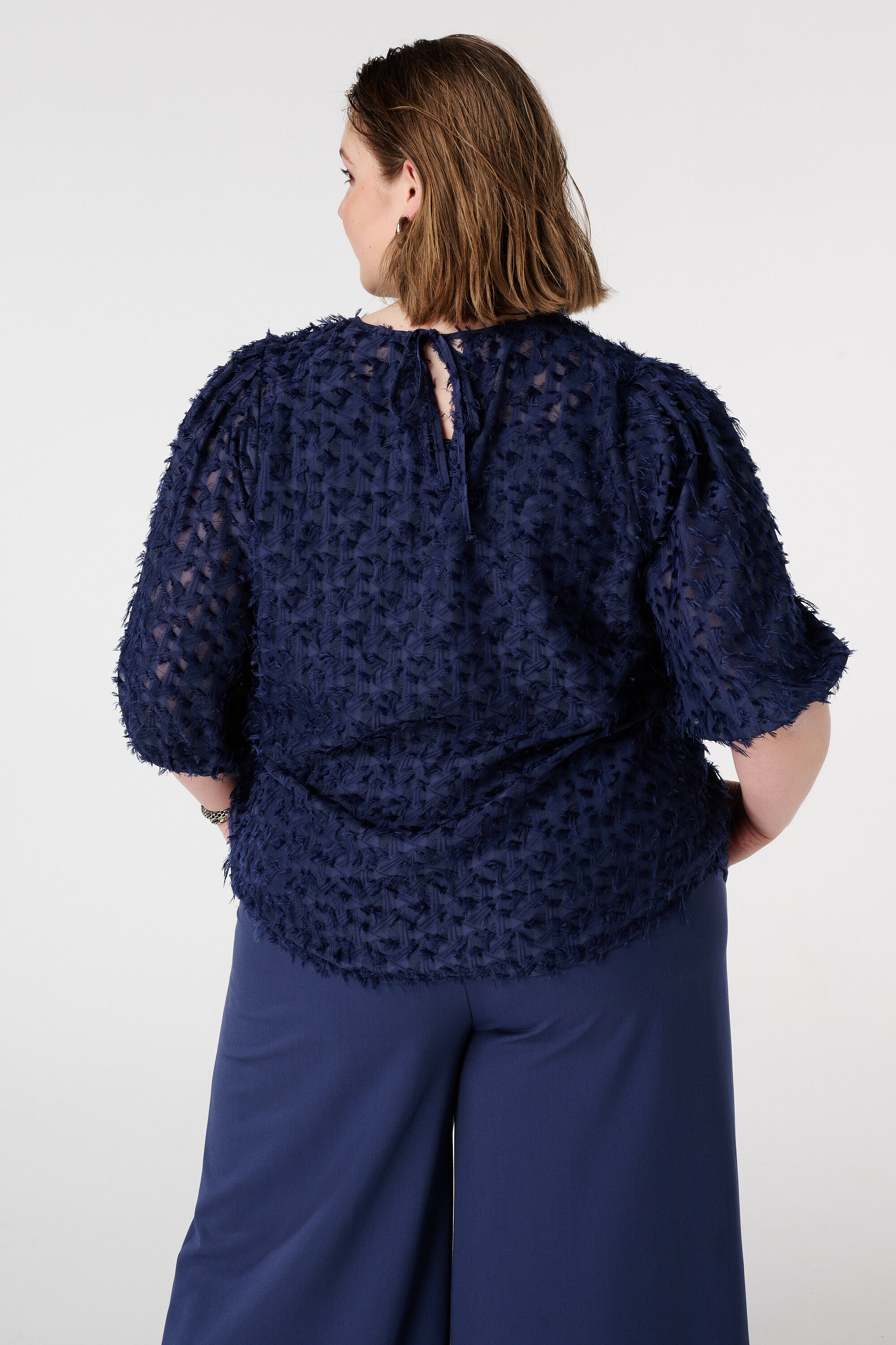 Top met structuur image number 3