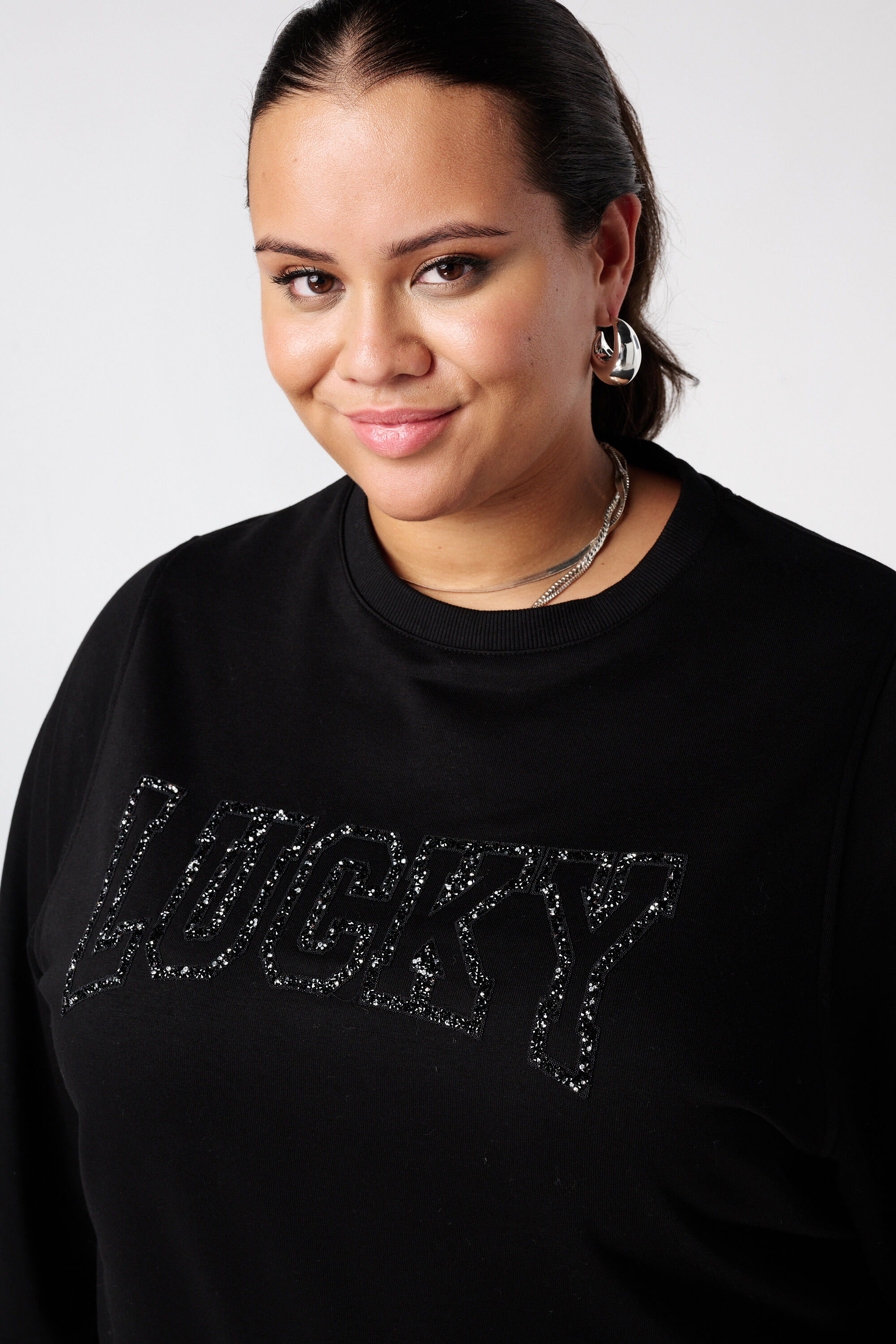 Sweater met glitter tekst image number 4