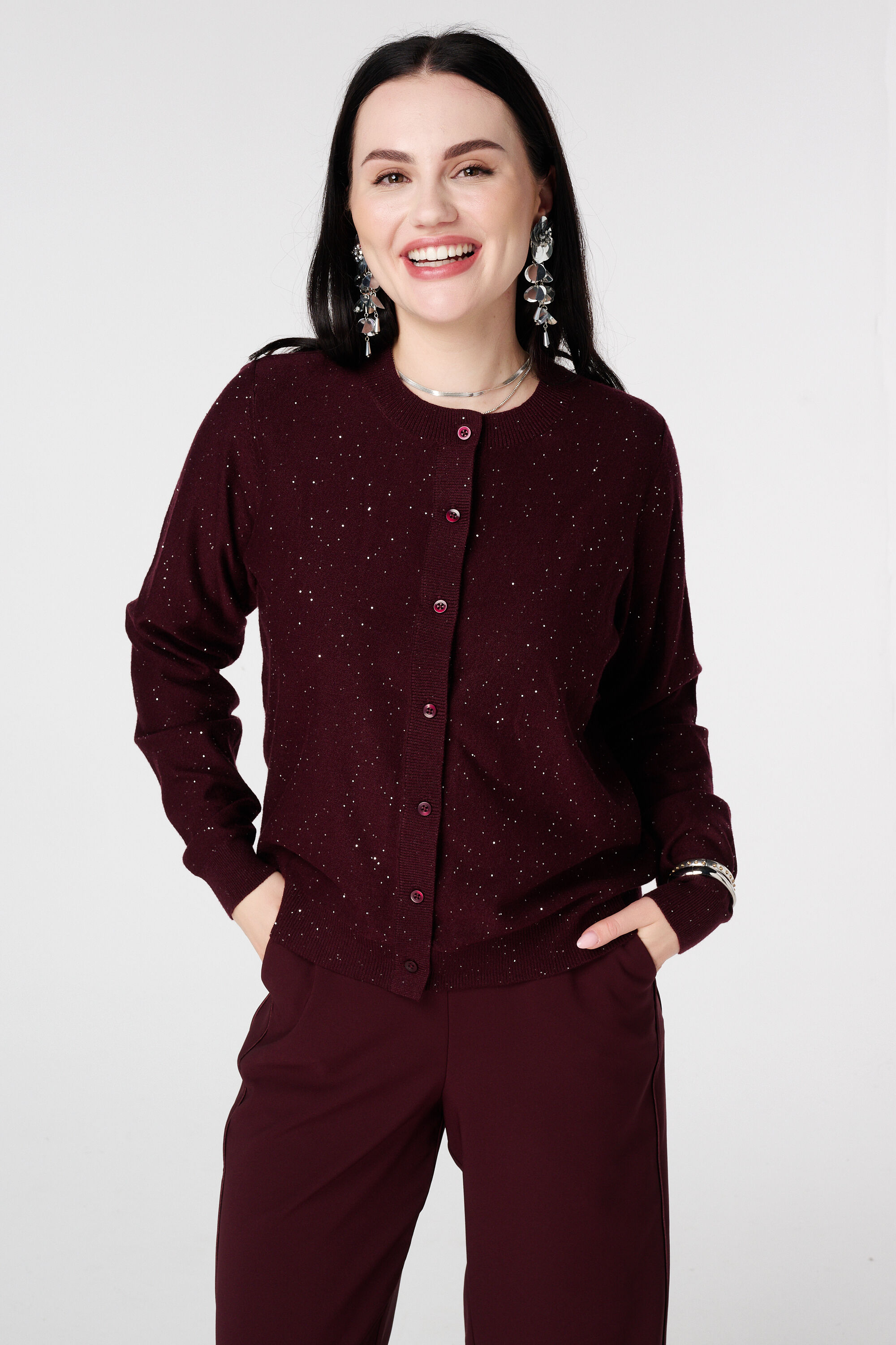 Fijn gebreid vestje met mini pailletten