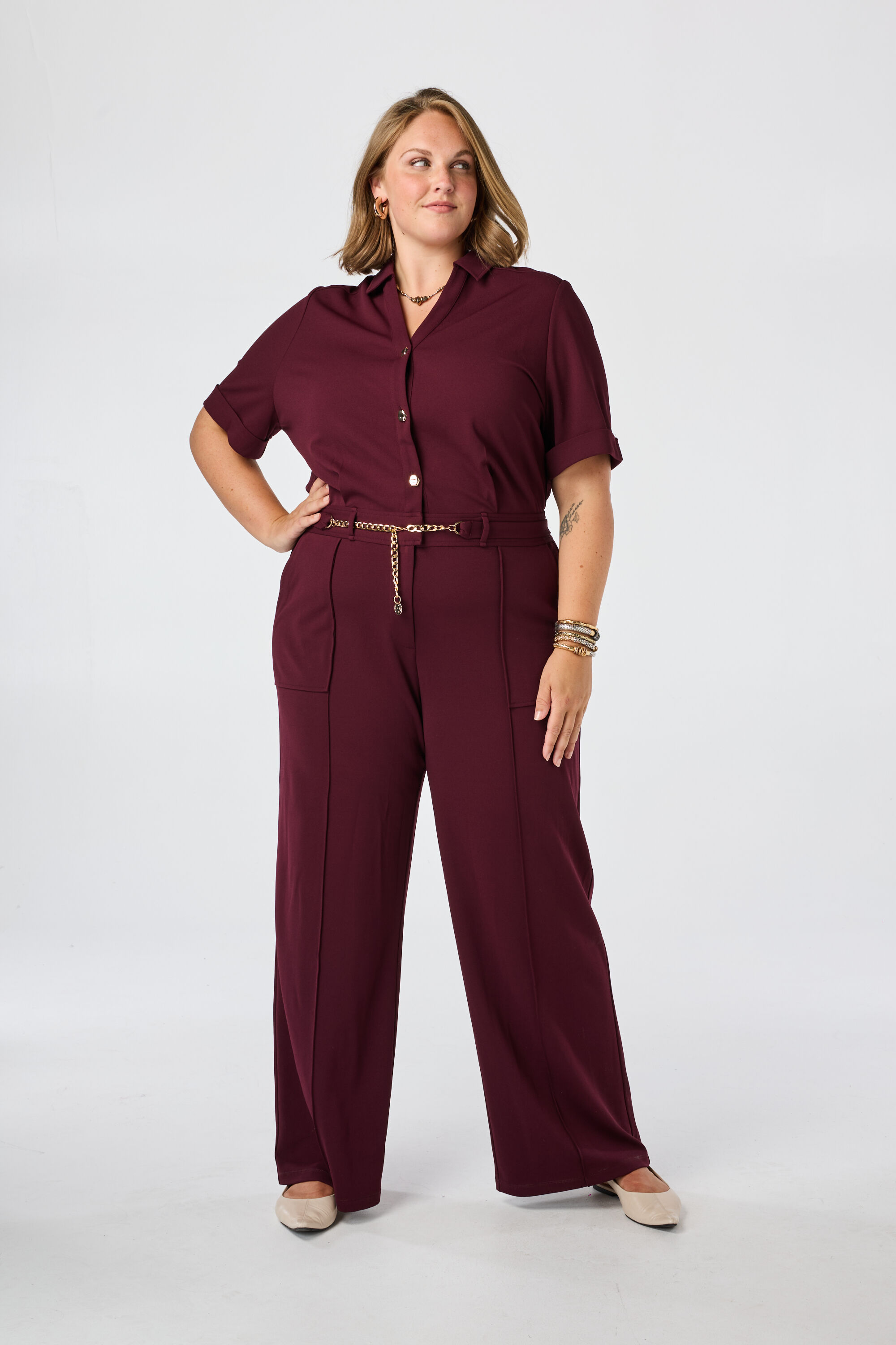 Jumpsuit met gouden ketting ceintuur