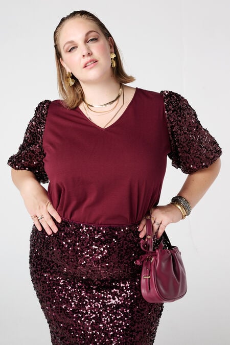 Top met pailletten pofmouwen Top met pailletten pofmouwen