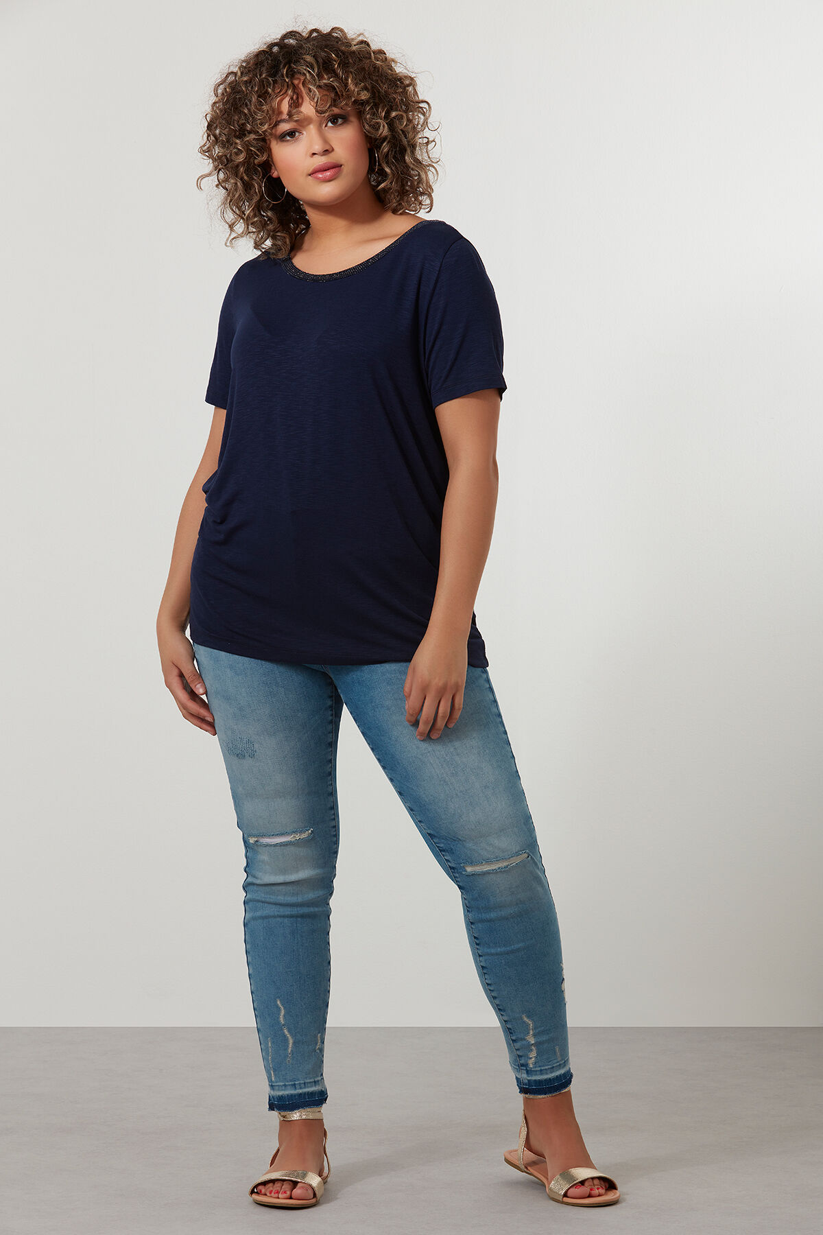 Slim leg jeans met scheuren image number 4